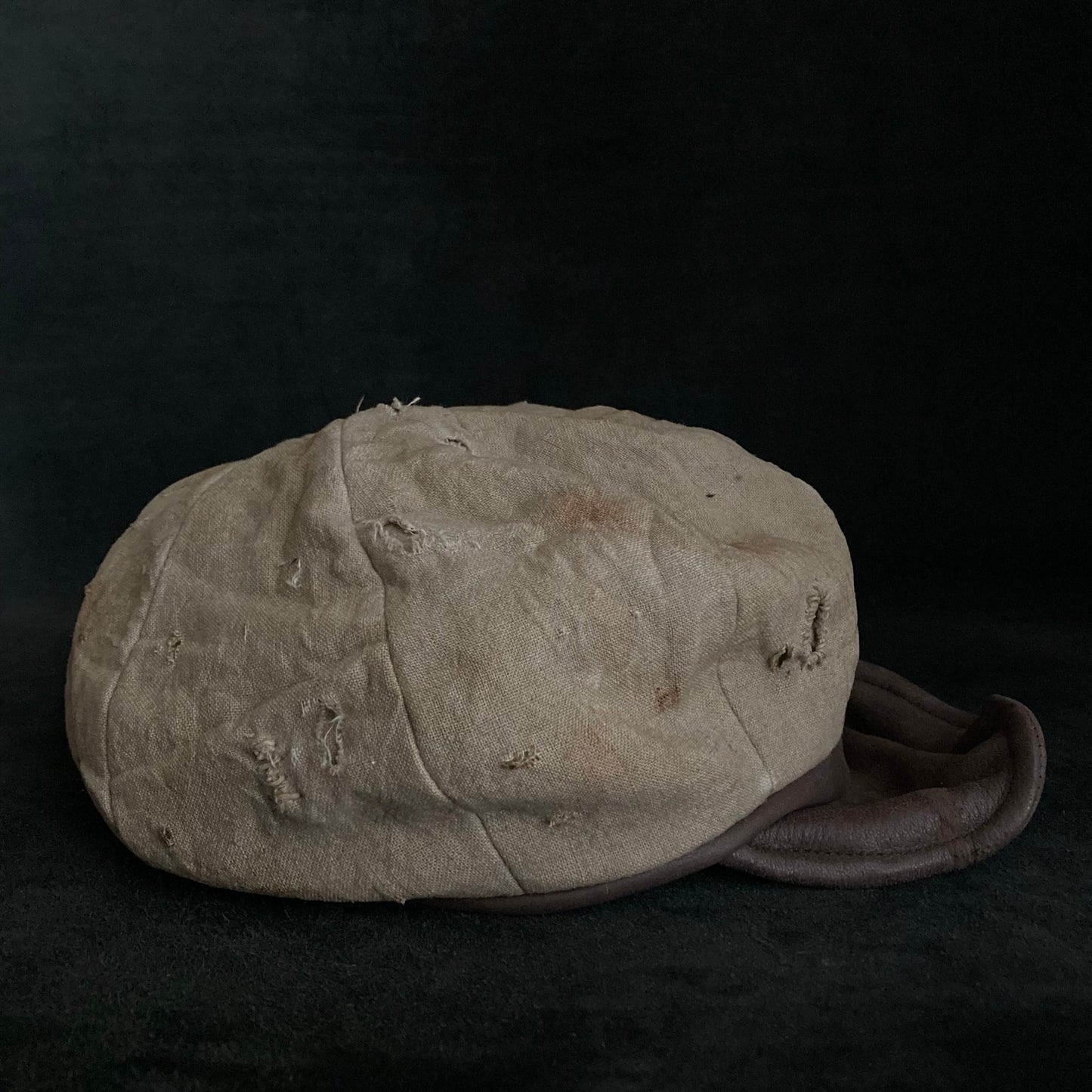 Sand tatters damage linen casquette