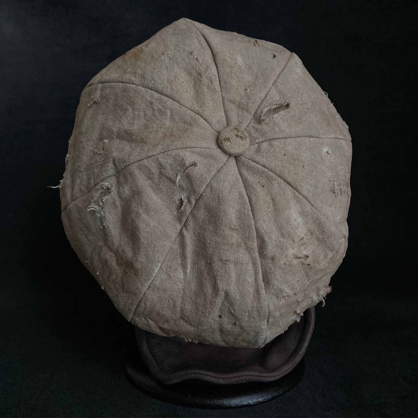 Sand tatters damage linen casquette