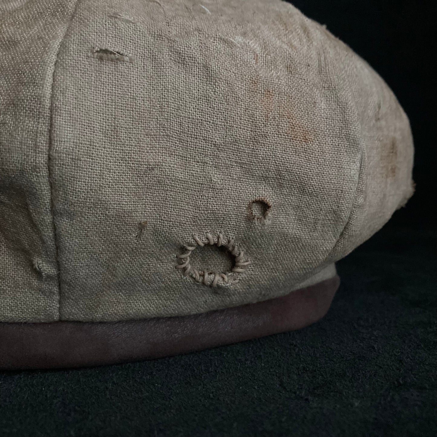 Sand tatters damage linen casquette