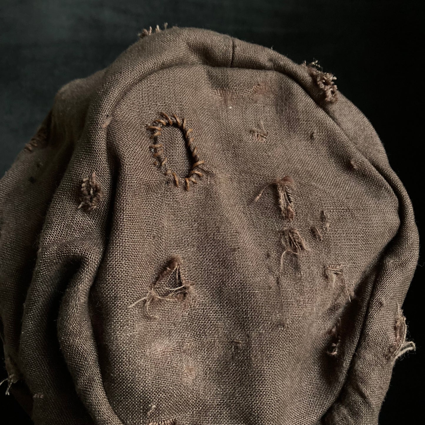 Brown linen damage martial turn cap (brim core)