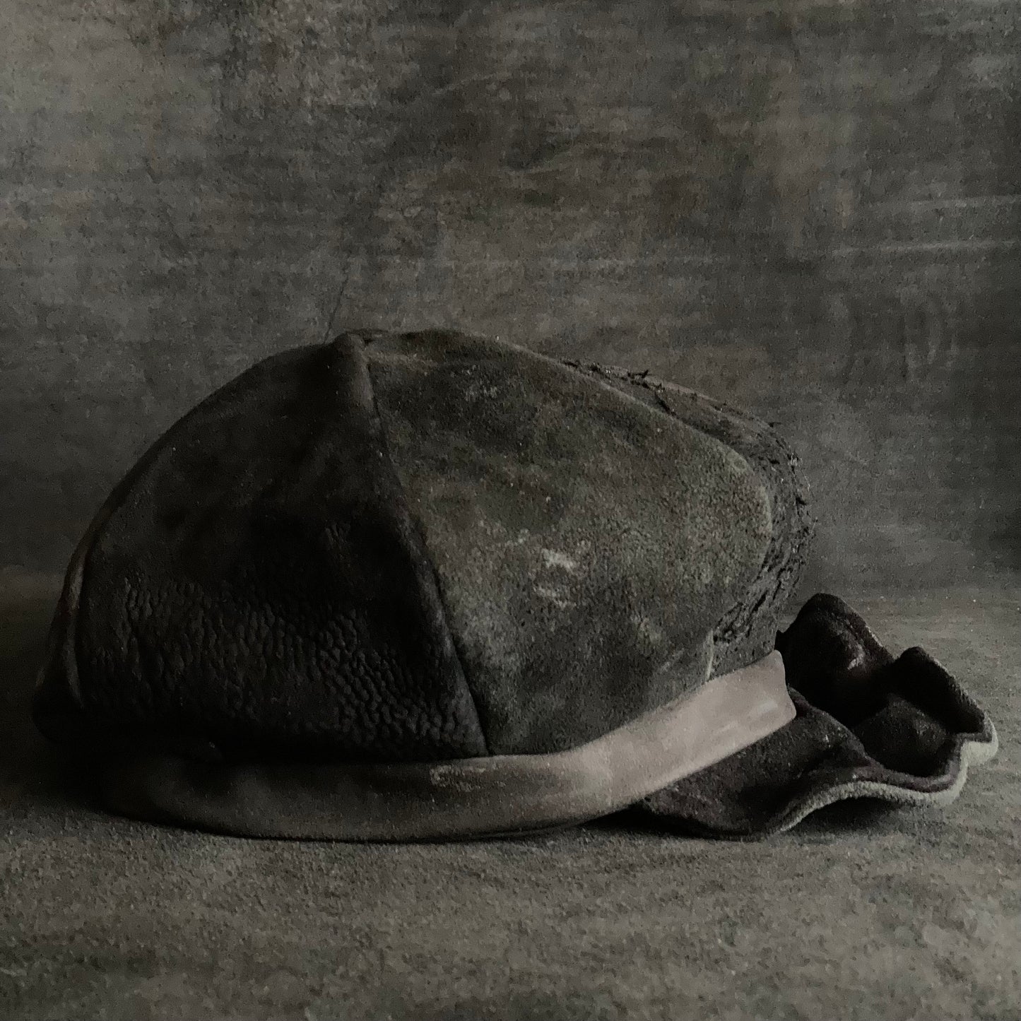 Each individual  black leather casquette