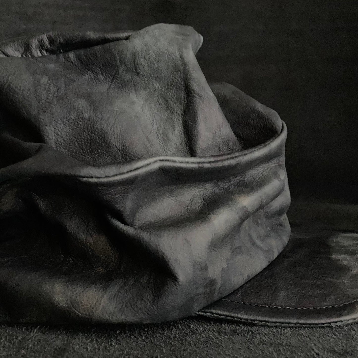 Rainy black leather turn cap