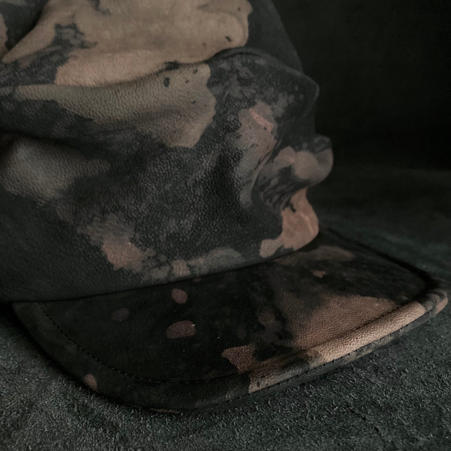 Horizon black leather turn cap