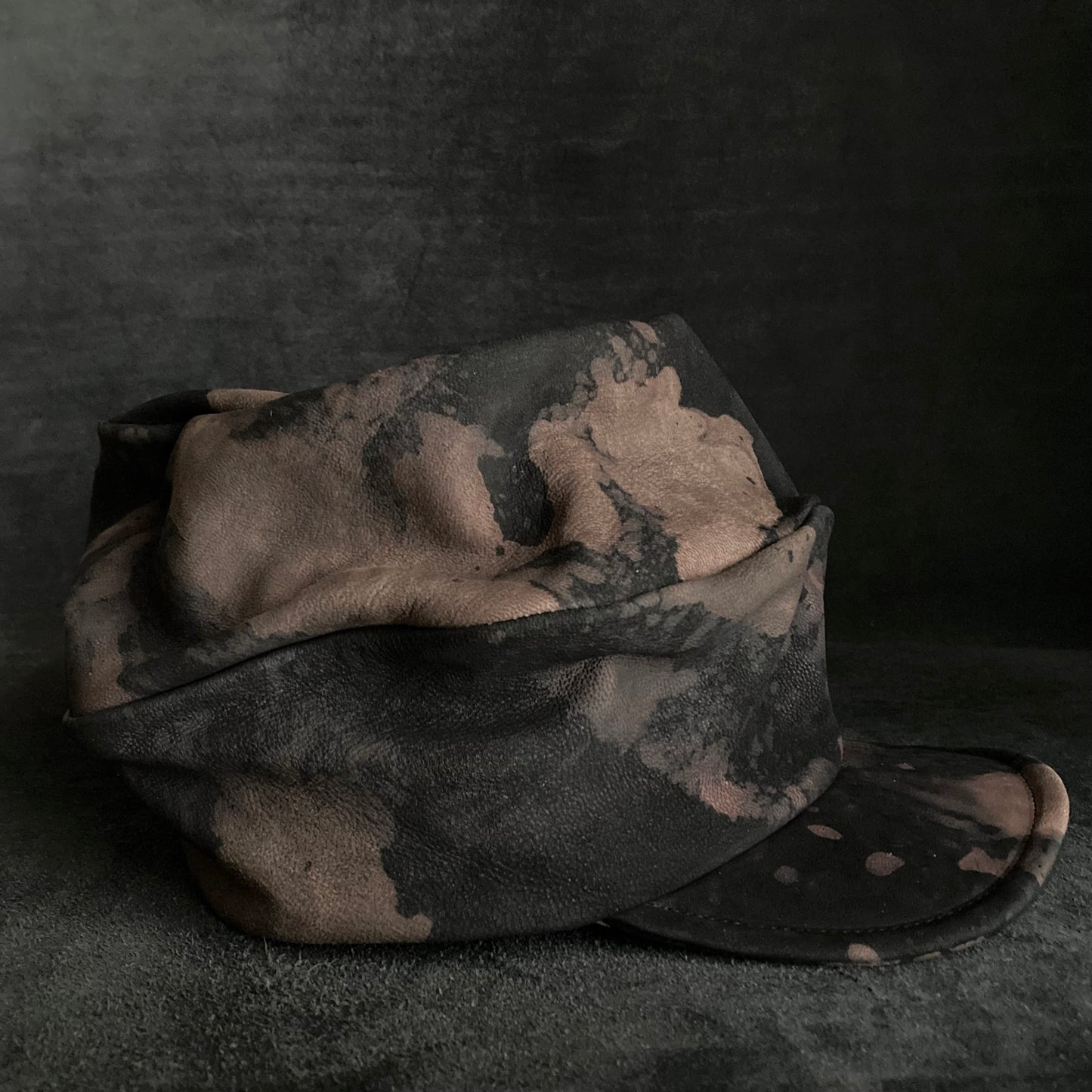 Horizon black leather turn cap