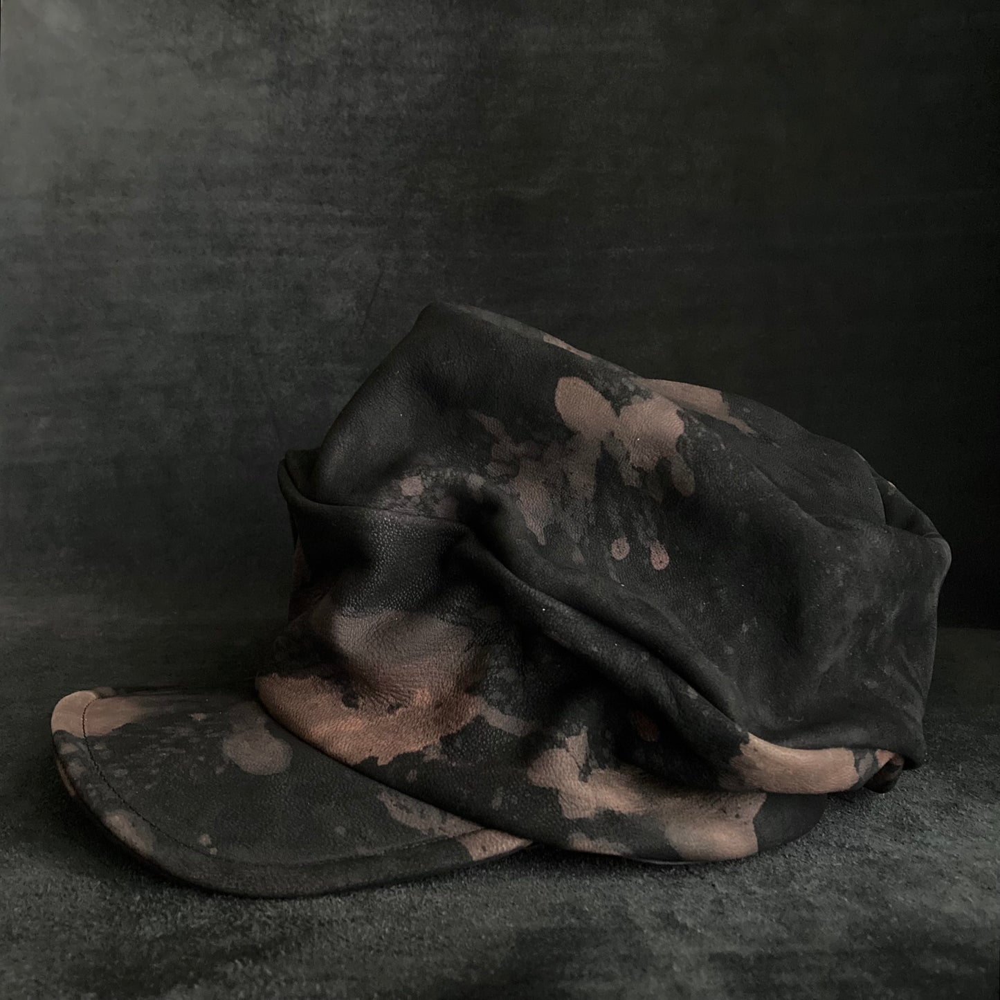 Horizon black leather turn cap