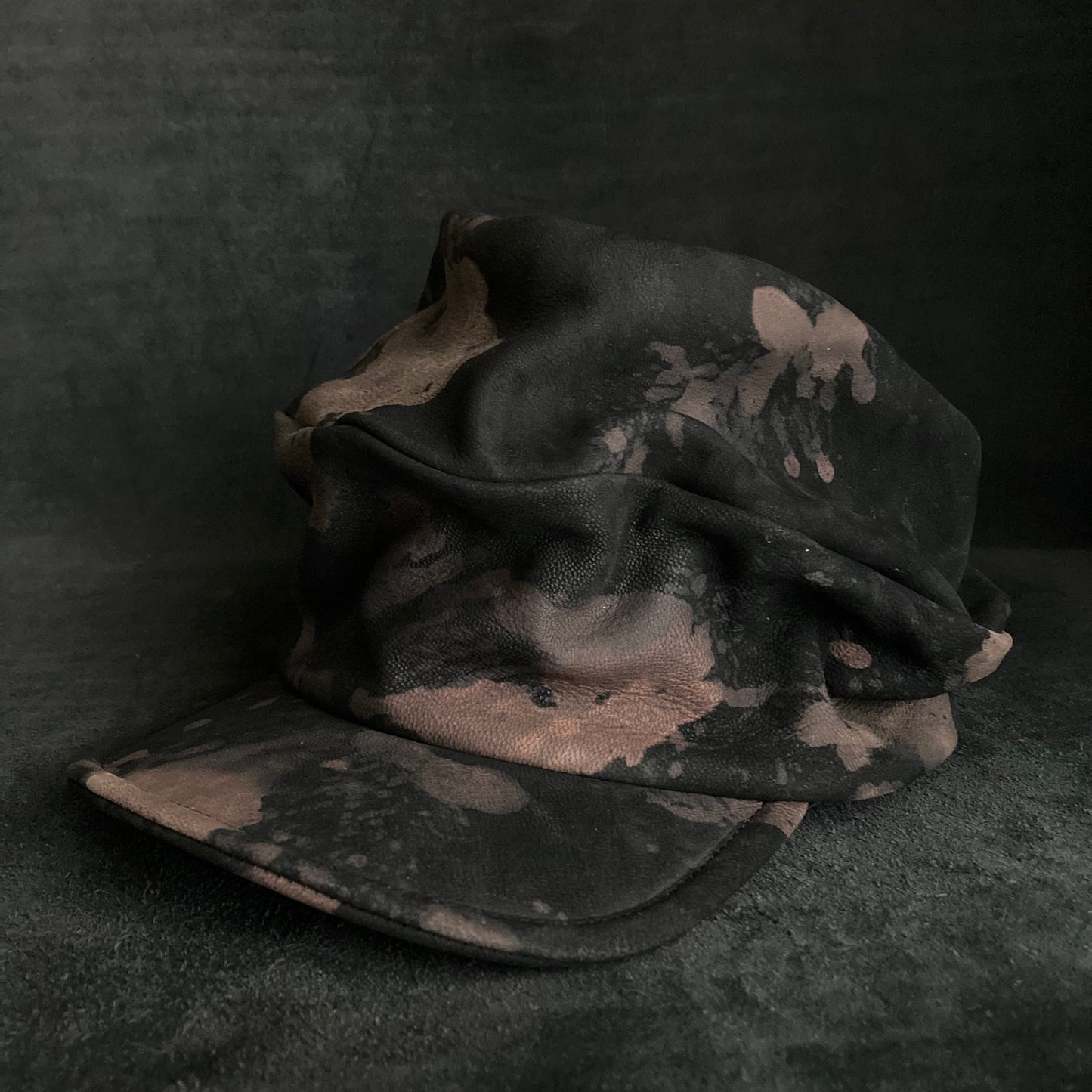 Horizon black leather turn cap