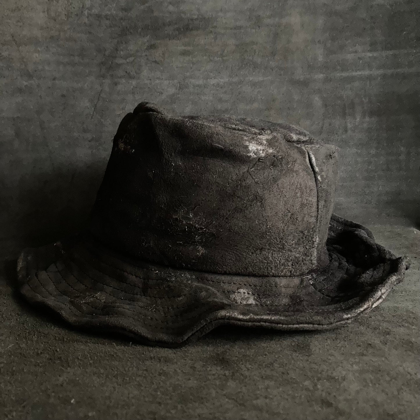 Washed back leather  bucket hat