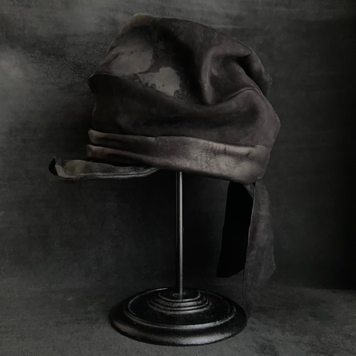 Bleaching black leather martial turn cap