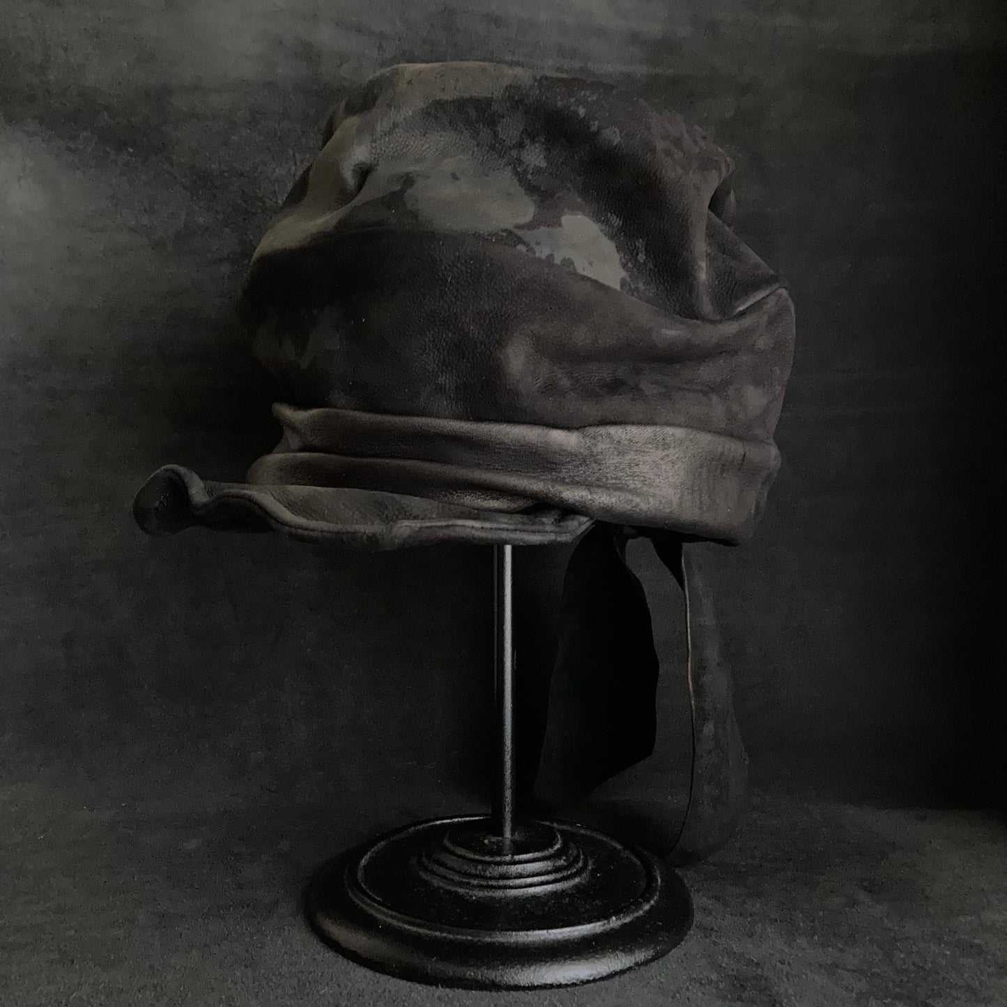 Bleaching black leather martial turn cap