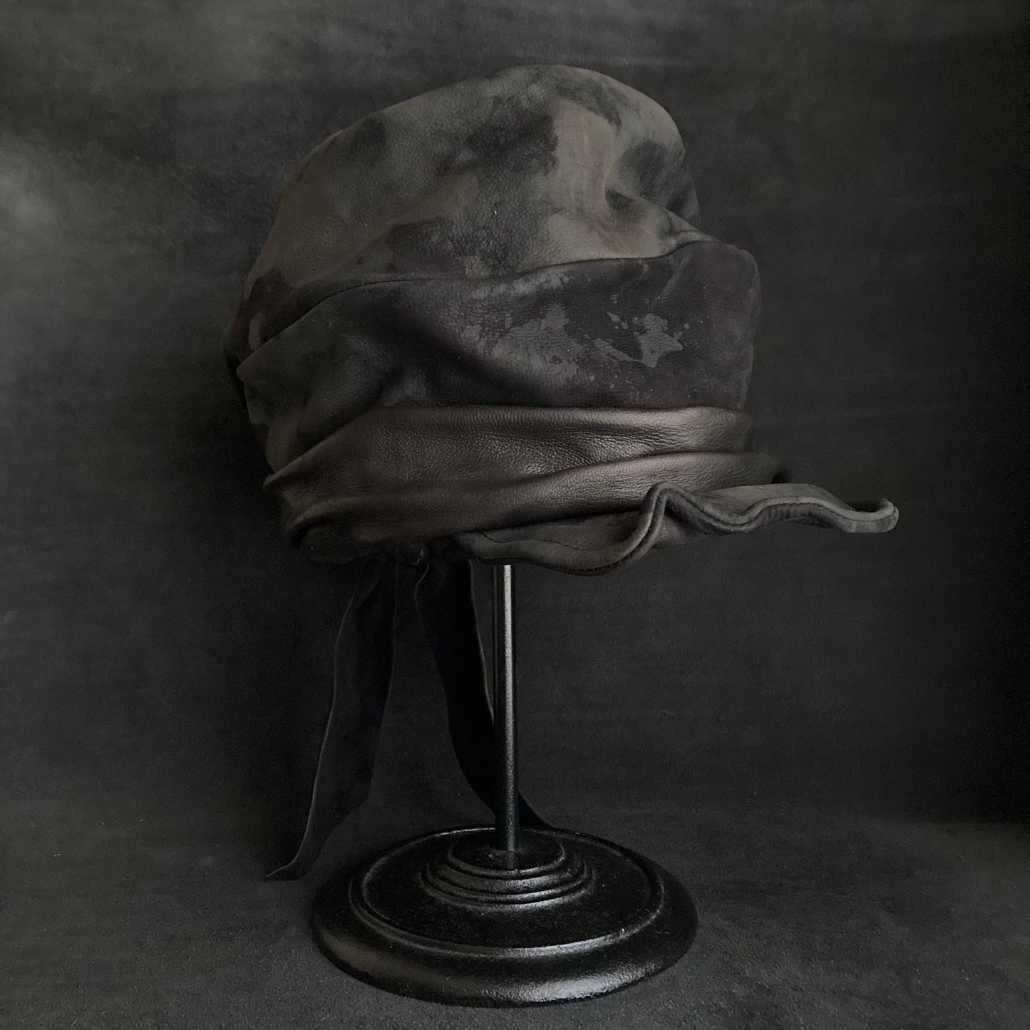 Bleaching black leather martial turn cap