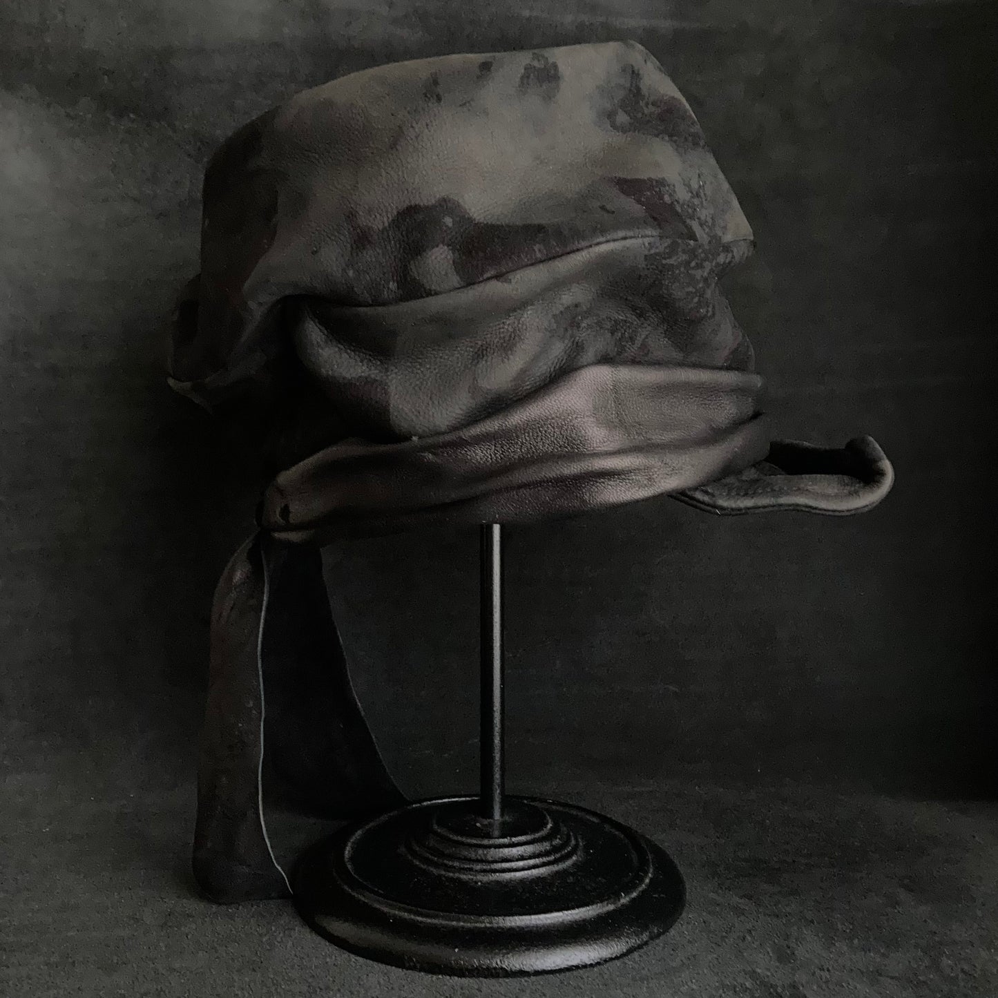 Bleaching black leather martial turn cap