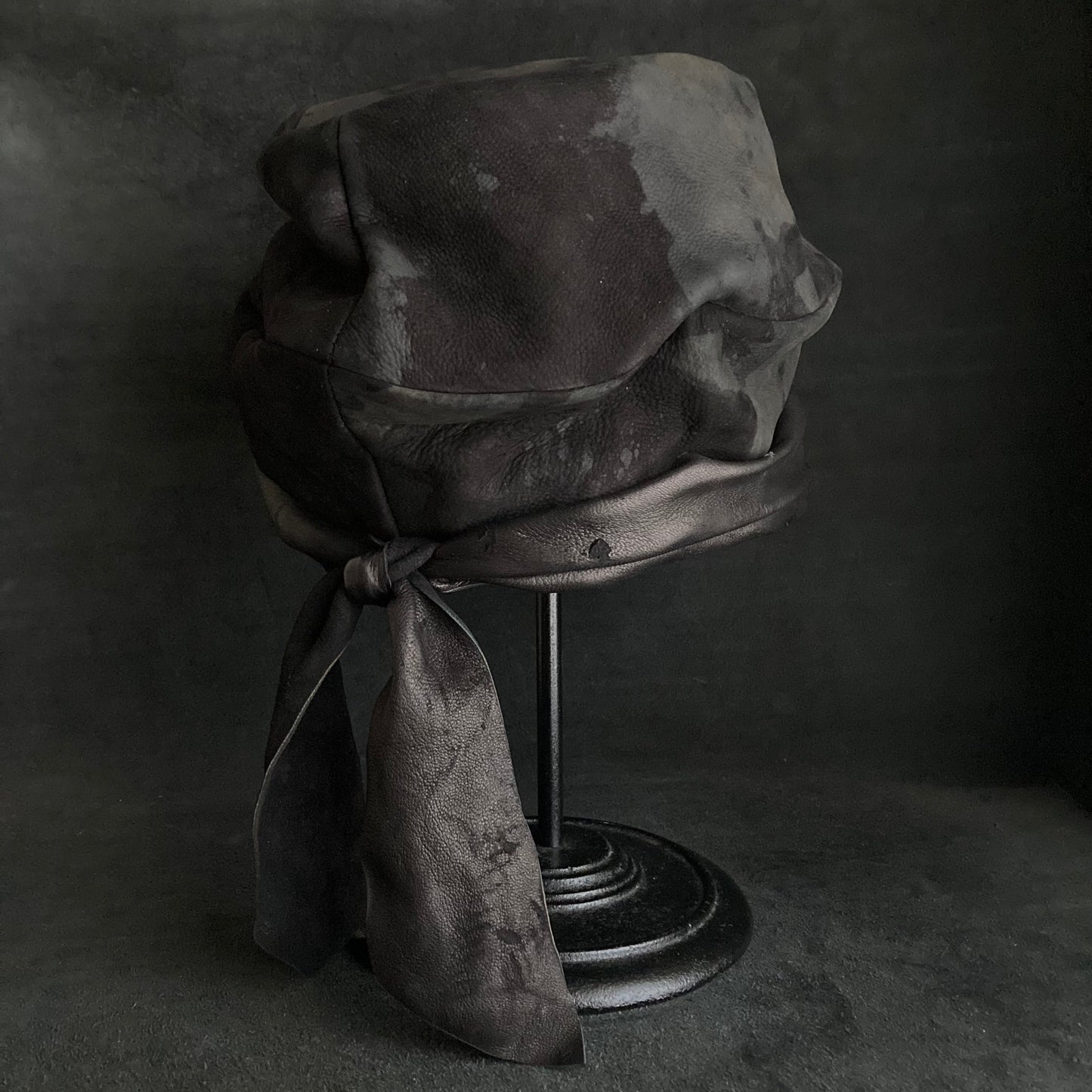 Bleaching black leather martial turn cap