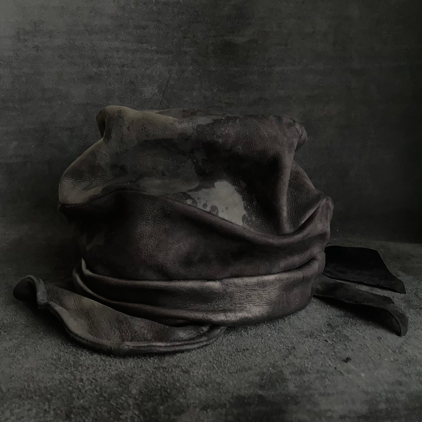 Bleaching black leather martial turn cap