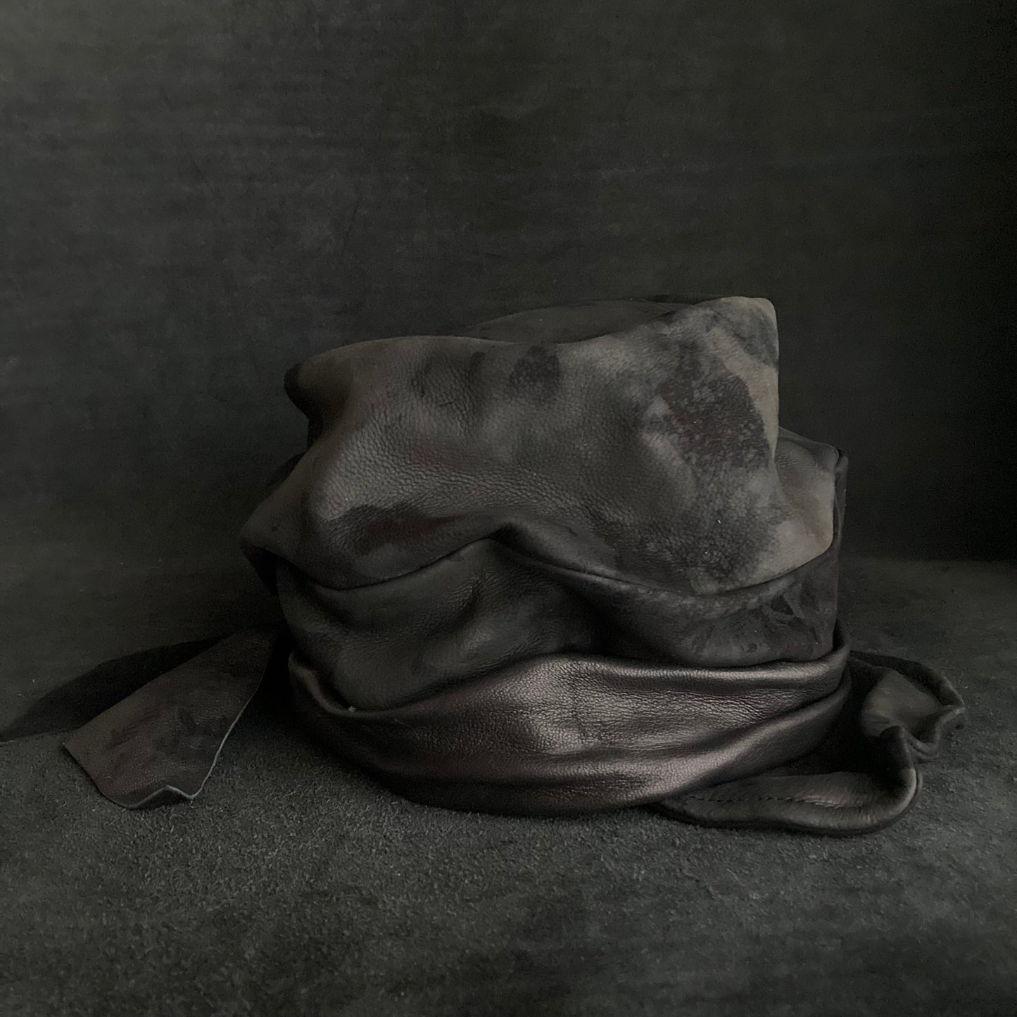 Bleaching black leather martial turn cap