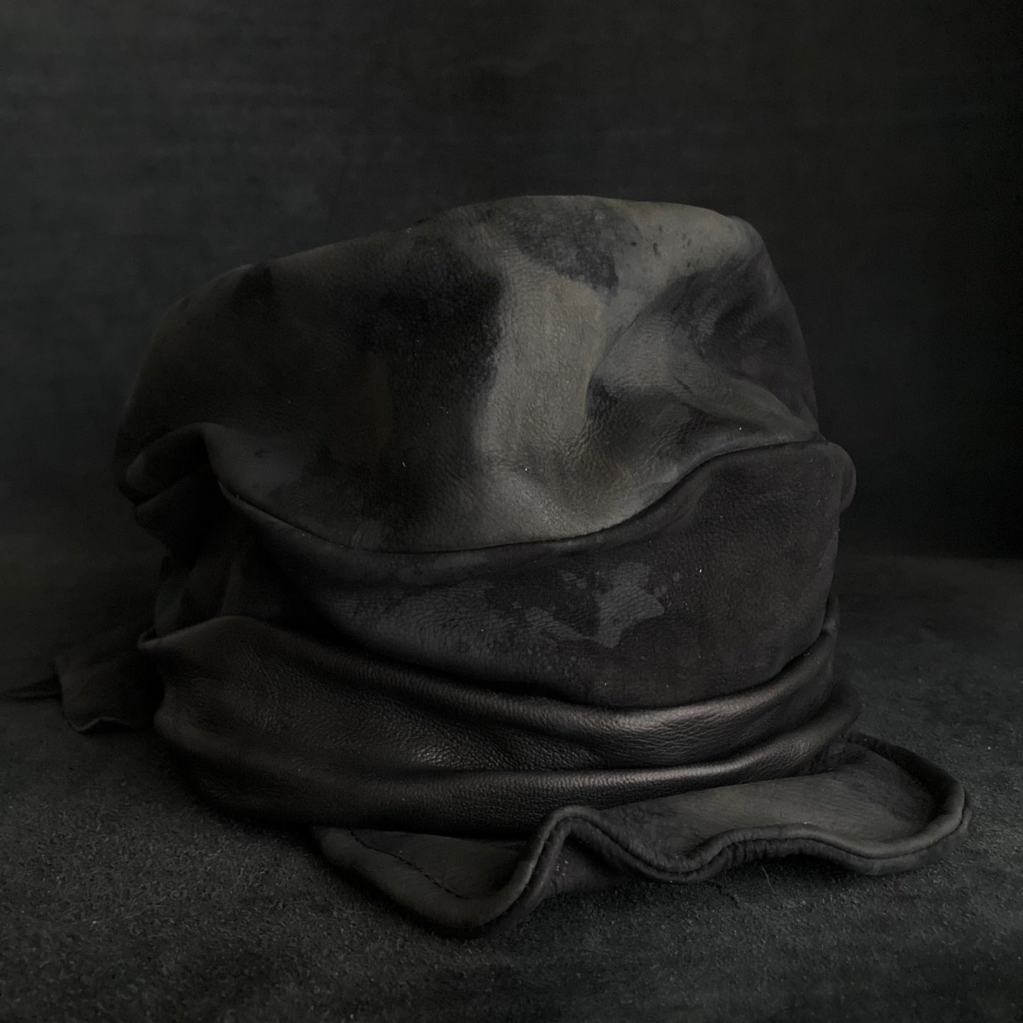 Bleaching black leather martial turn cap