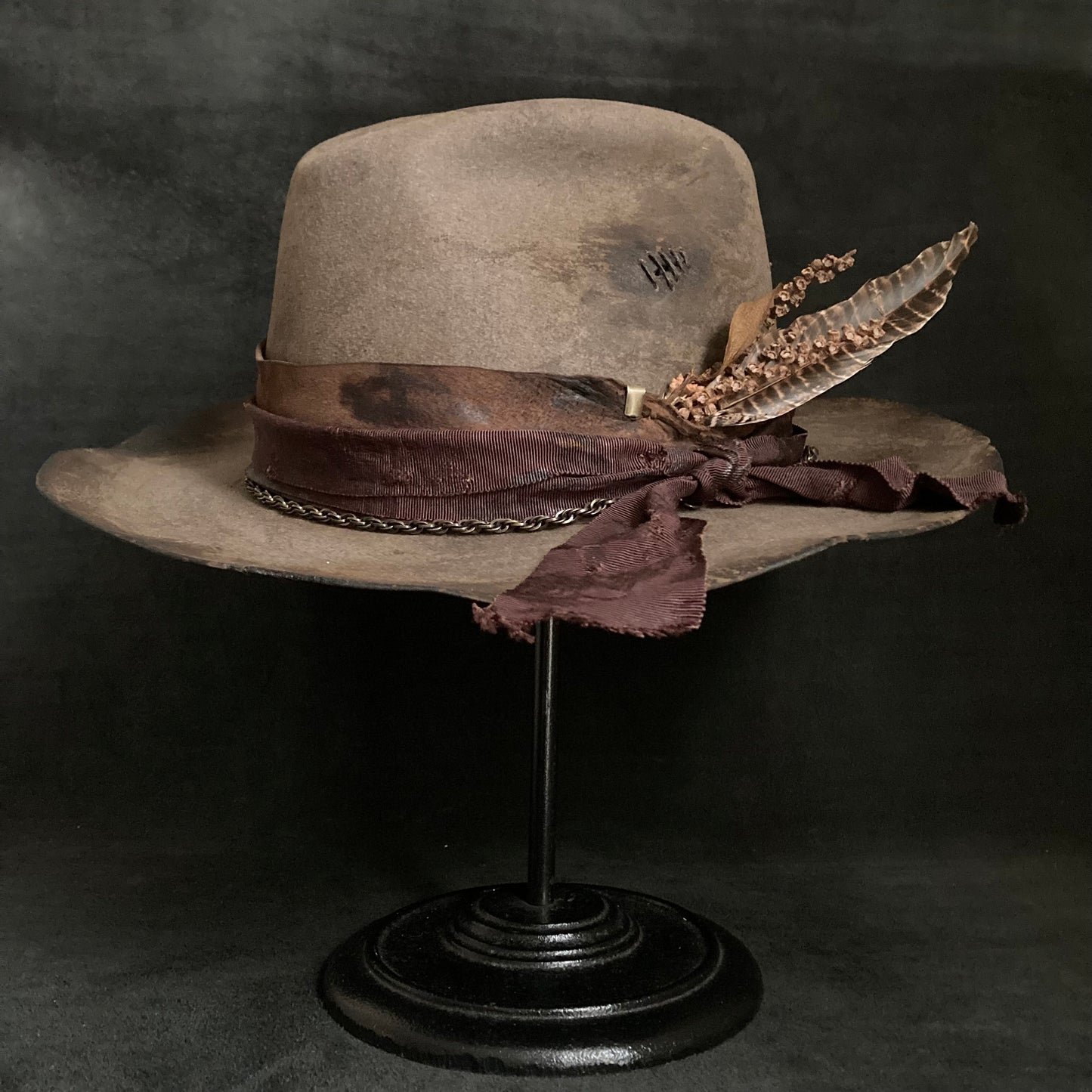 Old bitter brown western hat