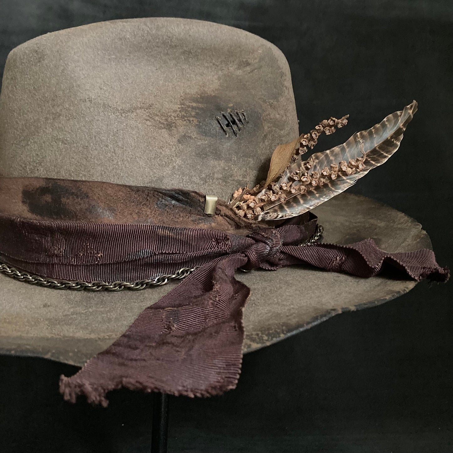 Old bitter brown western hat