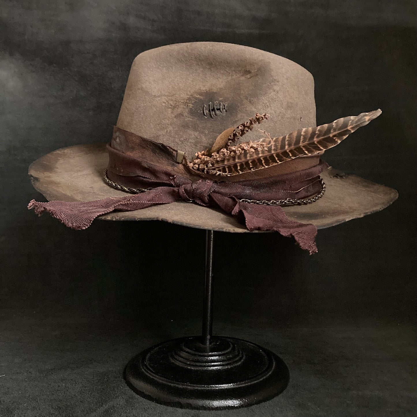 Old bitter brown western hat