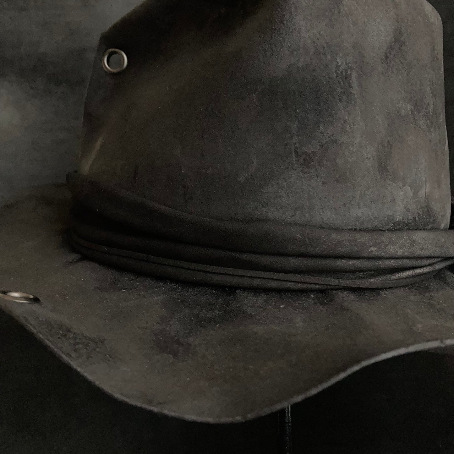 Charcoal eyelet back drooping leather fedora hat