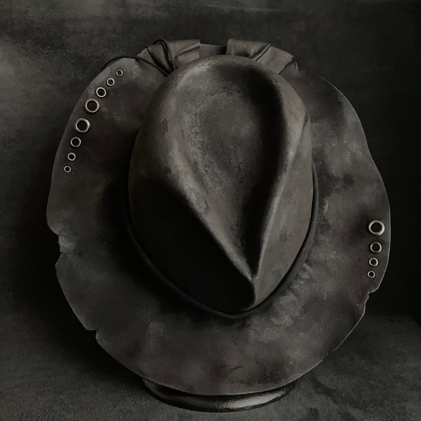 Charcoal eyelet back drooping leather fedora hat