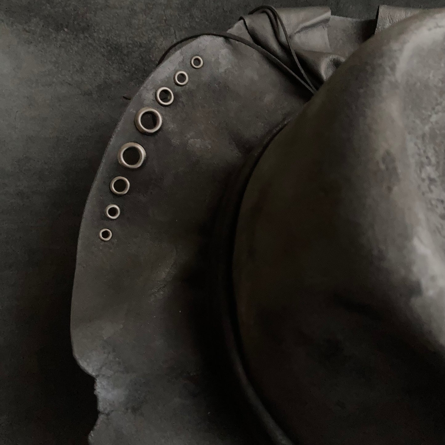 Charcoal eyelet back drooping leather fedora hat