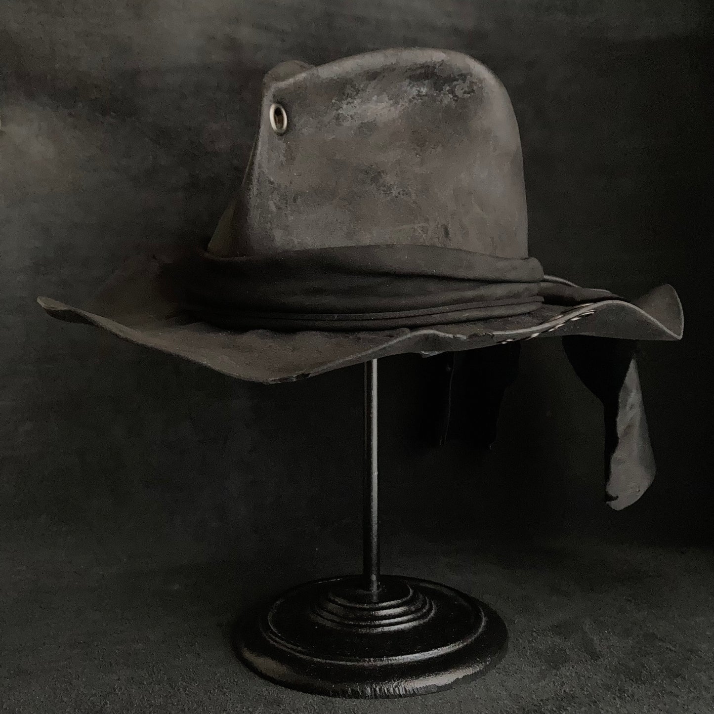 Charcoal eyelet back drooping leather fedora hat