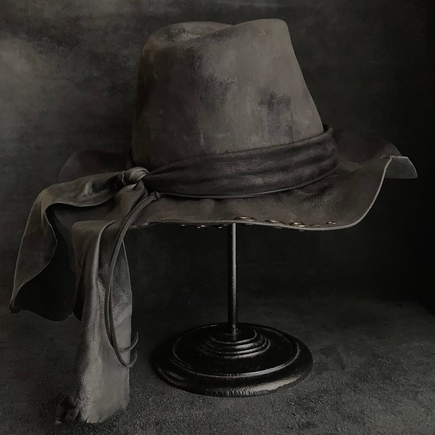 Charcoal eyelet back drooping leather fedora hat