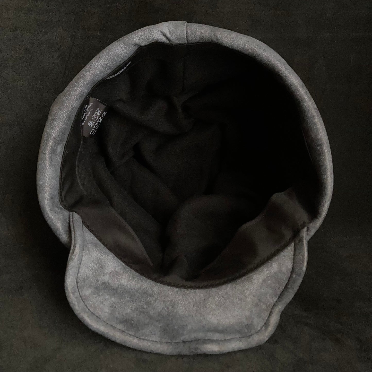 Rain gray leather turn cap