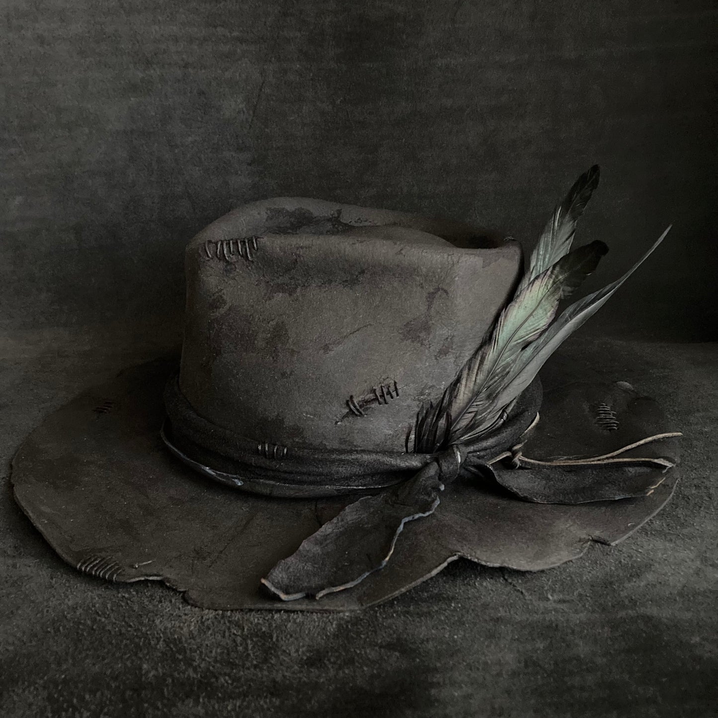 Charcoal wax stitch broken fedora hat