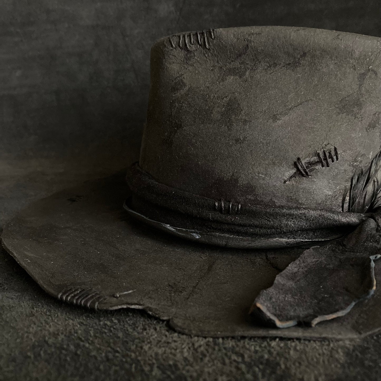 Charcoal wax stitch broken fedora hat