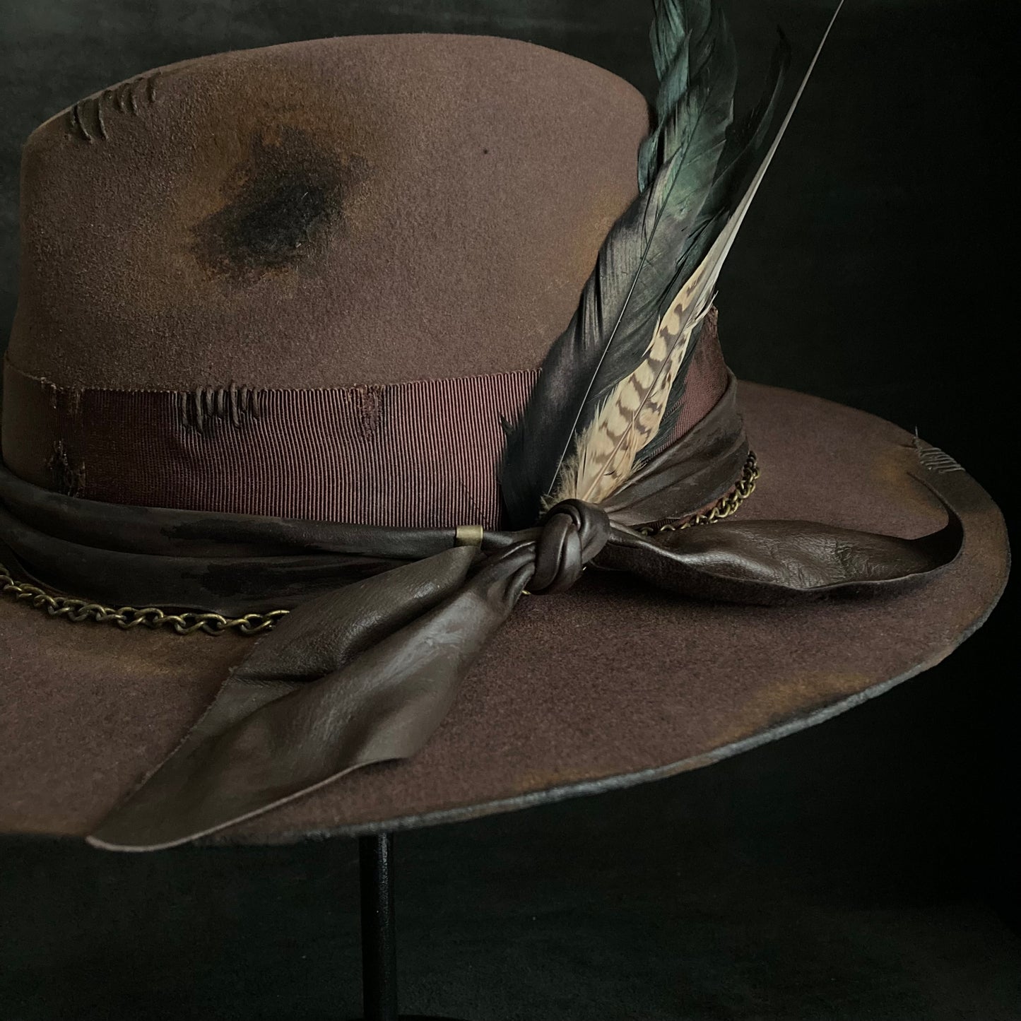 Burned brown dark feather fedora hat