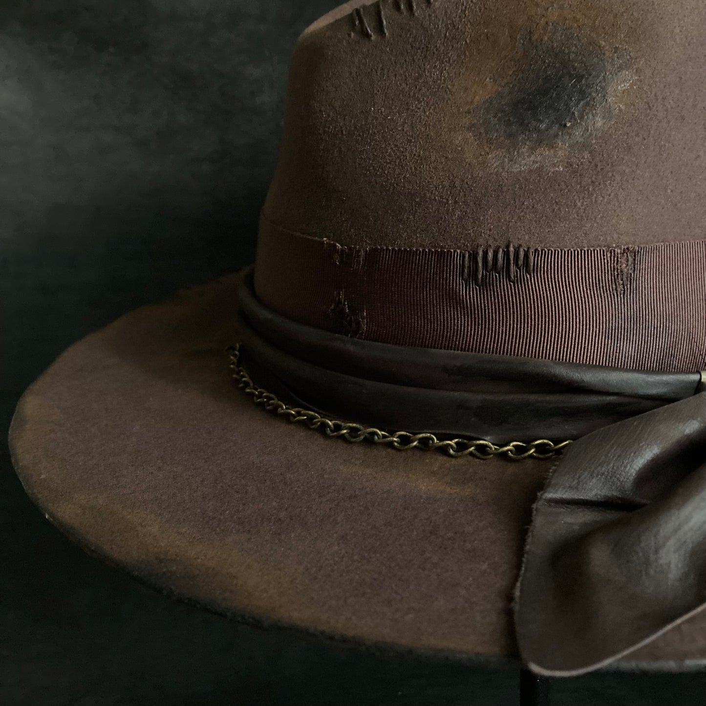 Burned brown dark feather fedora hat