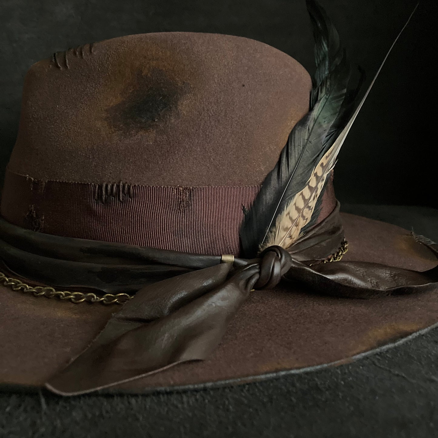Burned brown dark feather fedora hat
