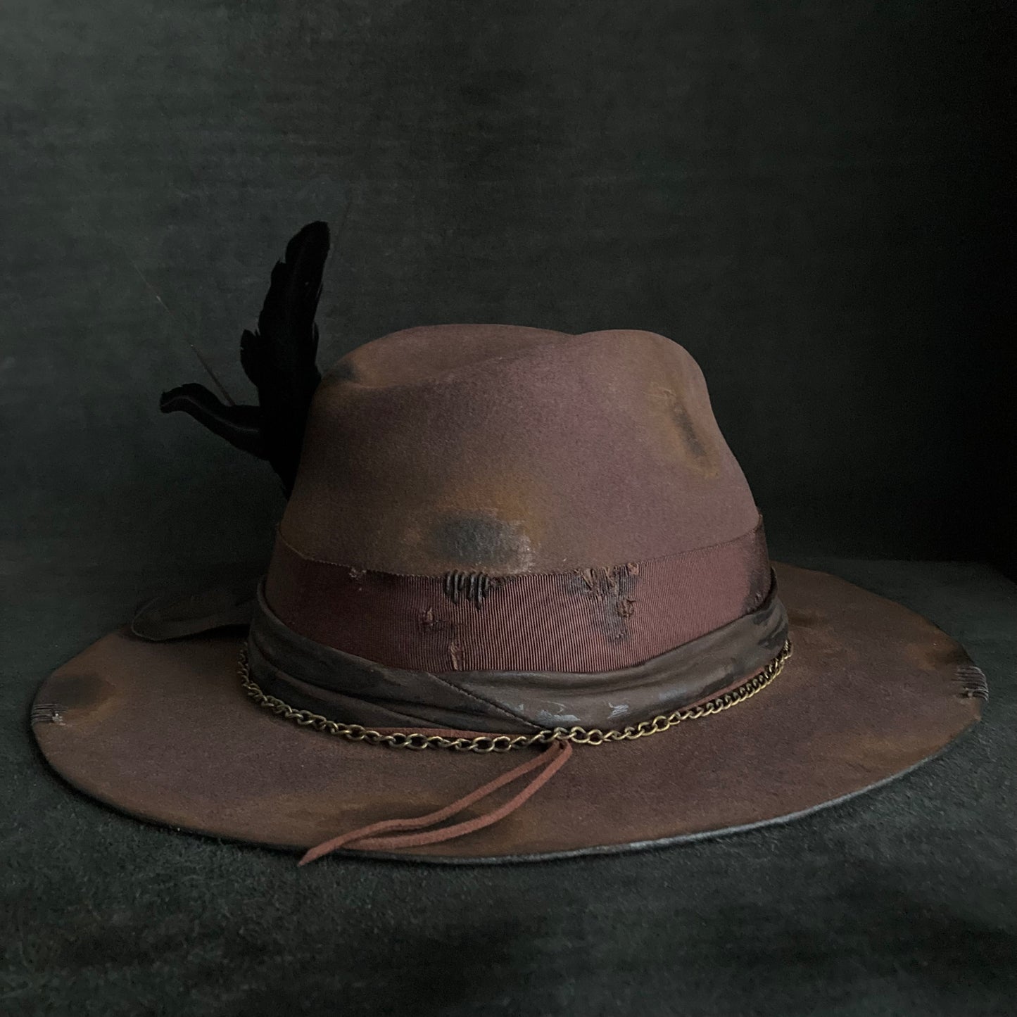 Burned brown dark feather fedora hat