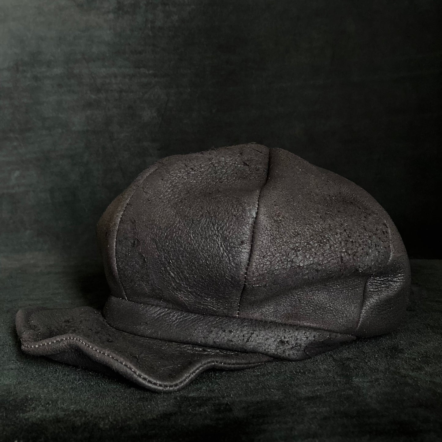 Graphite black leather casquette