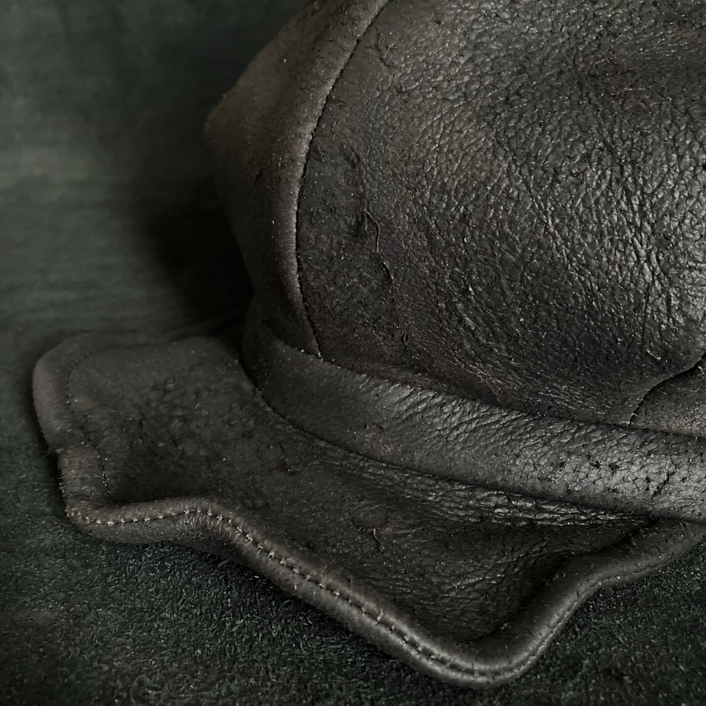 Graphite black leather casquette