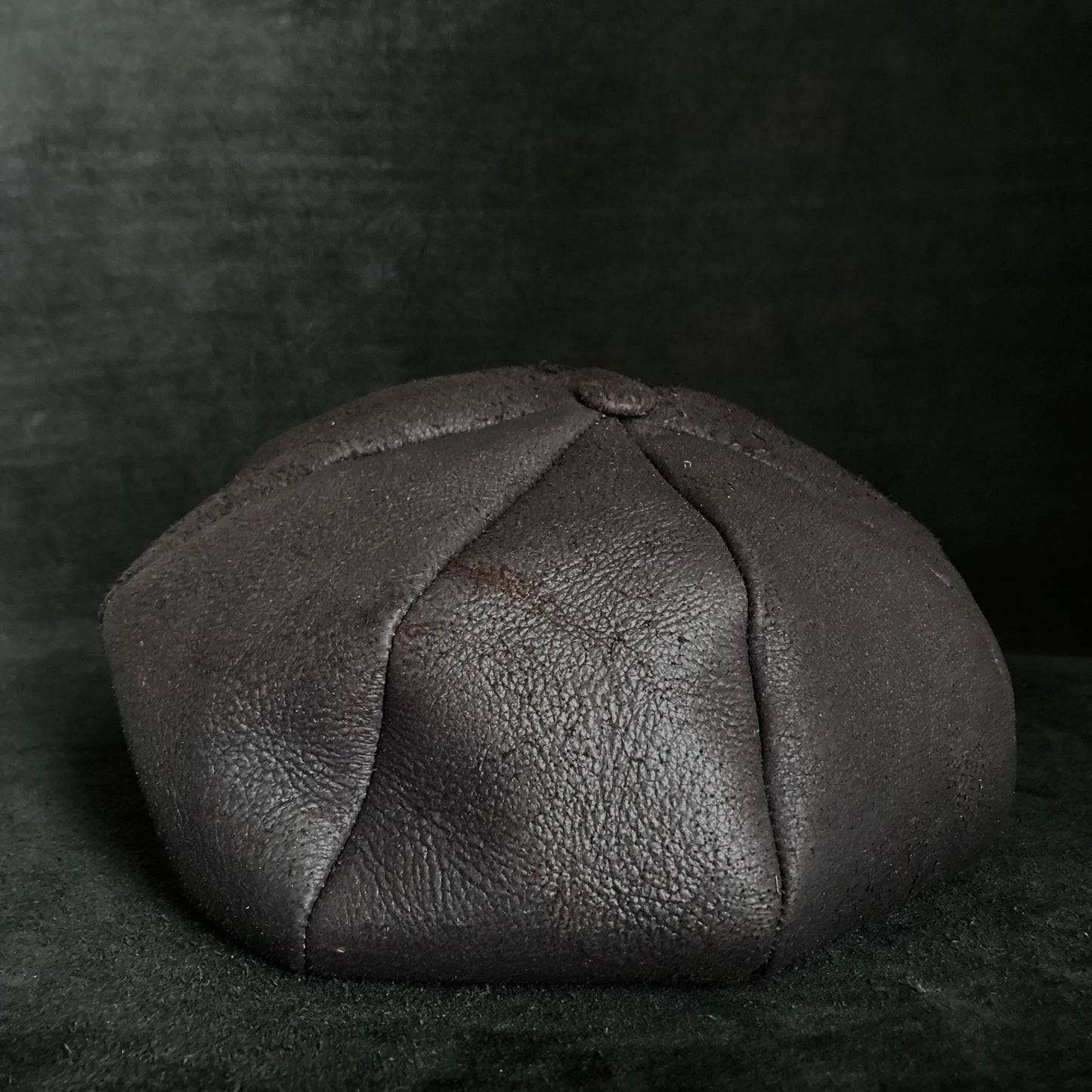 Graphite black leather casquette