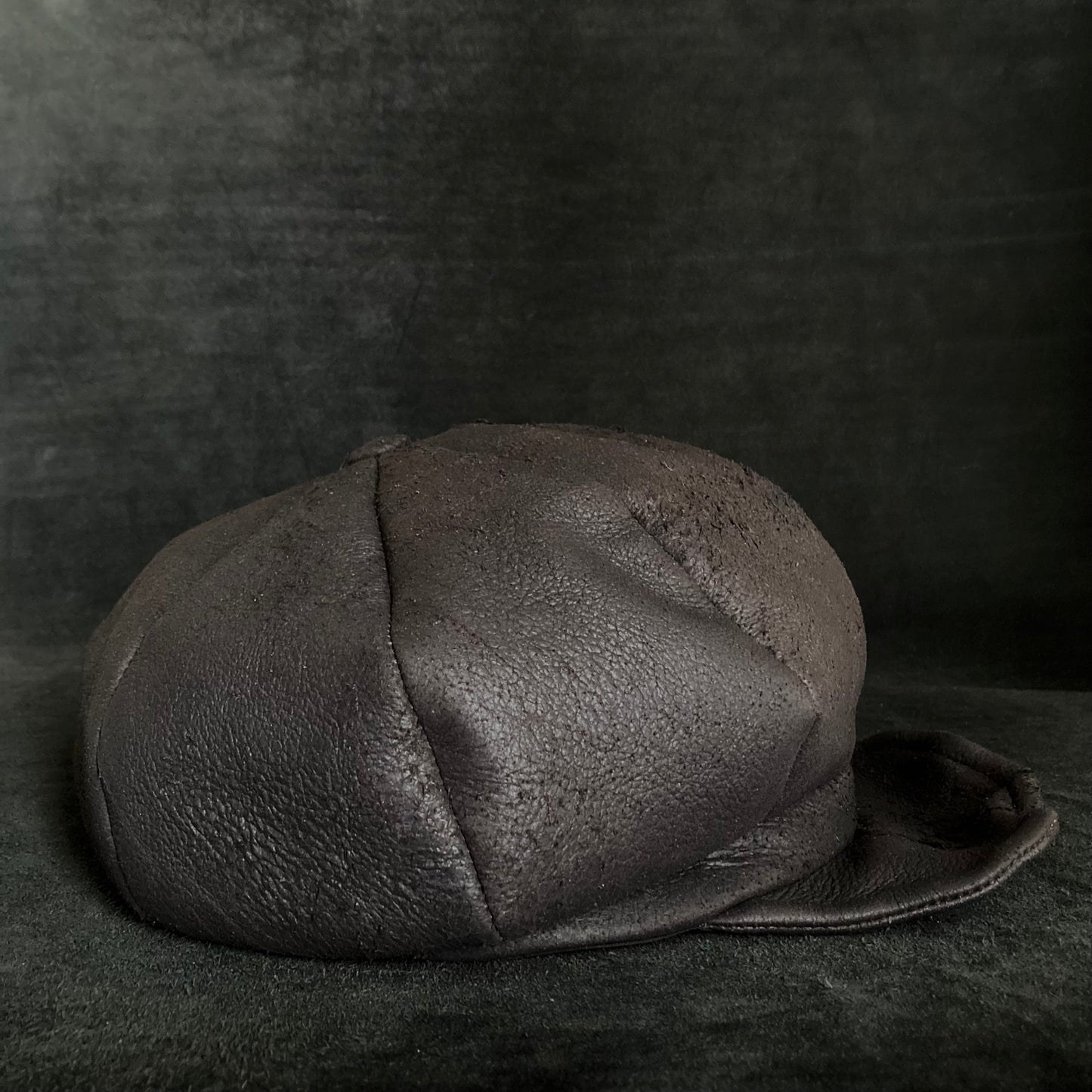 Graphite black leather casquette