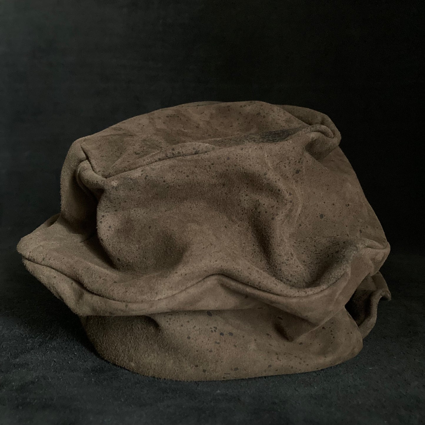 Scattered leather turn cap