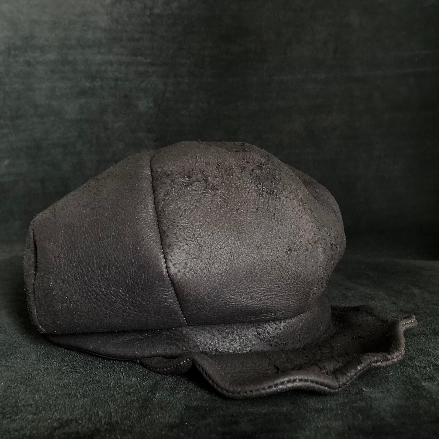Graphite black leather casquette