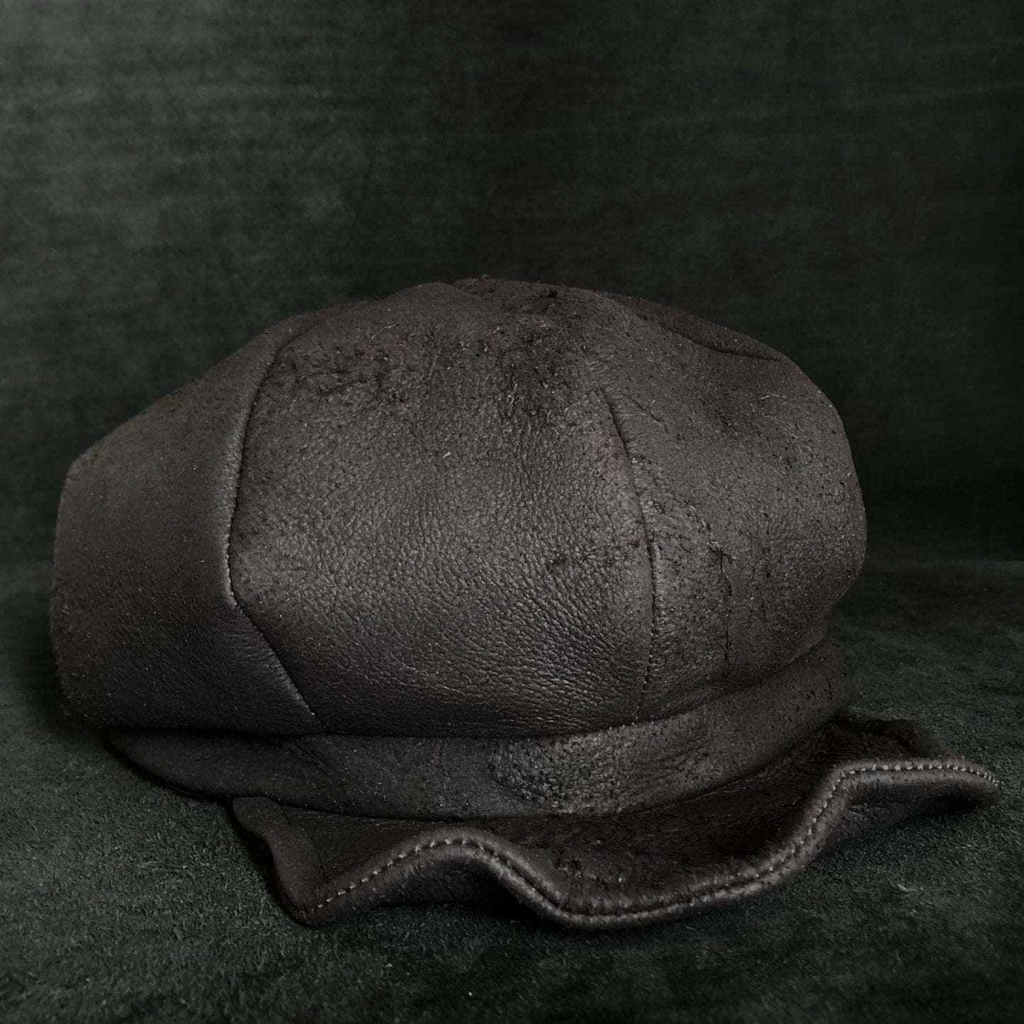 Graphite black leather casquette