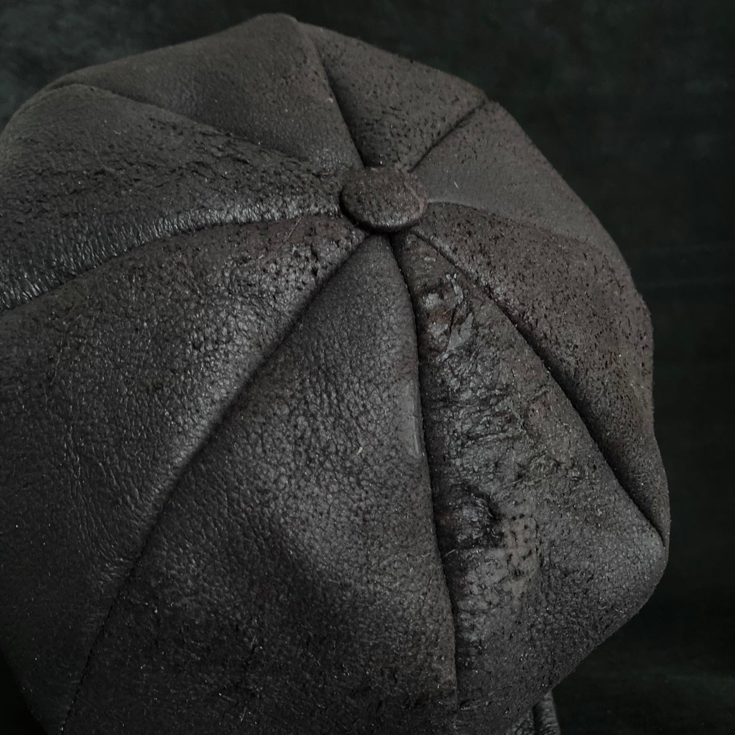 Graphite black leather casquette