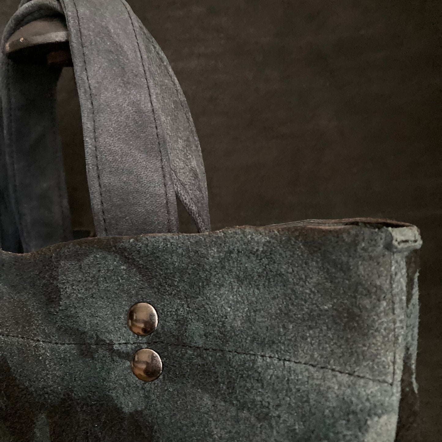 Bleached pale blue black leather tote bag