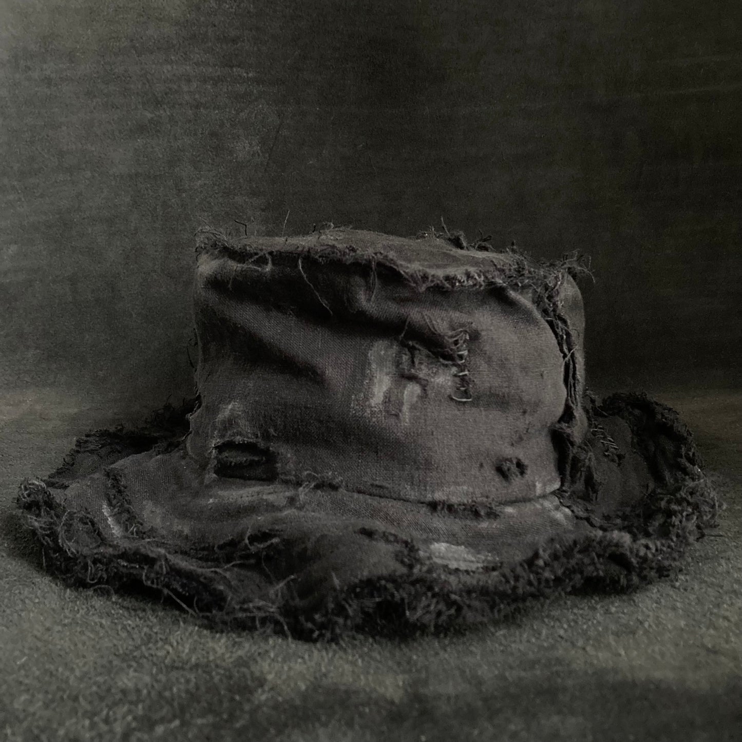 Back side black linen damage bucket hat
