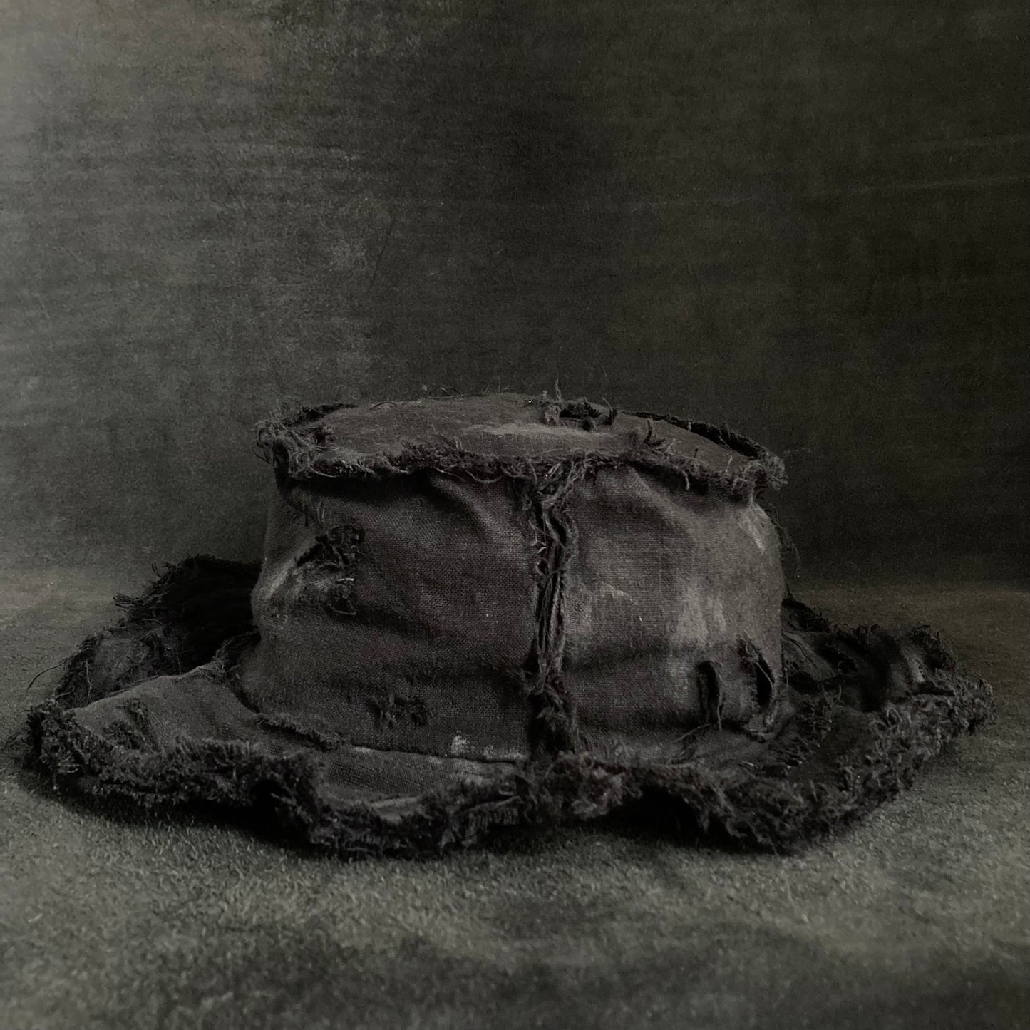 Back side black linen damage bucket hat