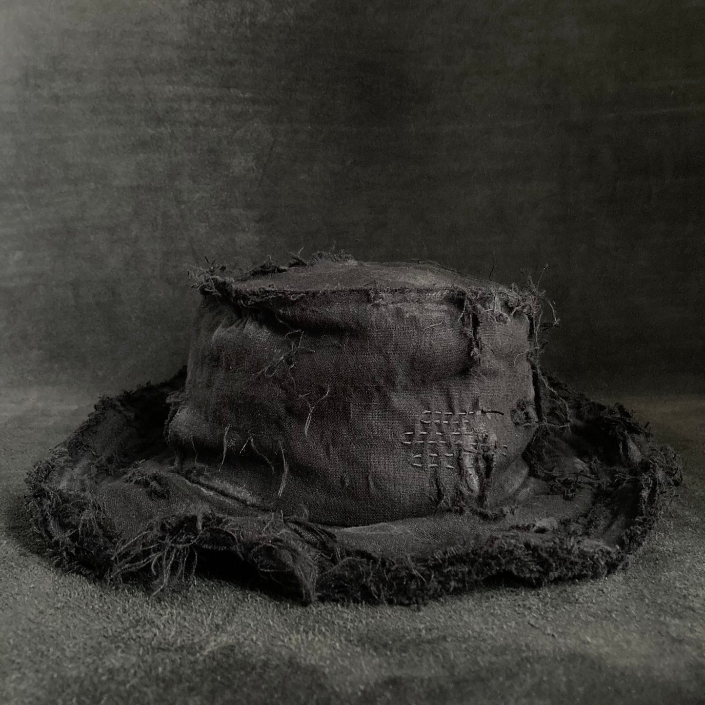 Back side black linen damage bucket hat