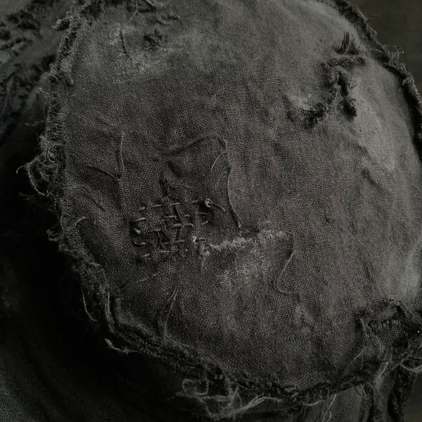 Back side black linen damage bucket hat