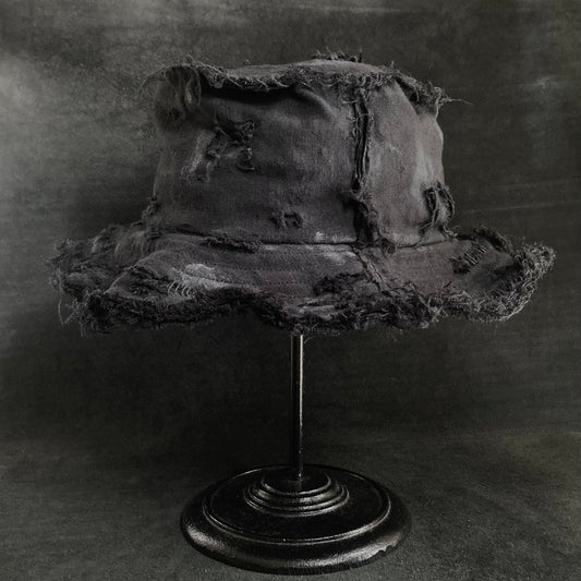 Back side black linen damage bucket hat