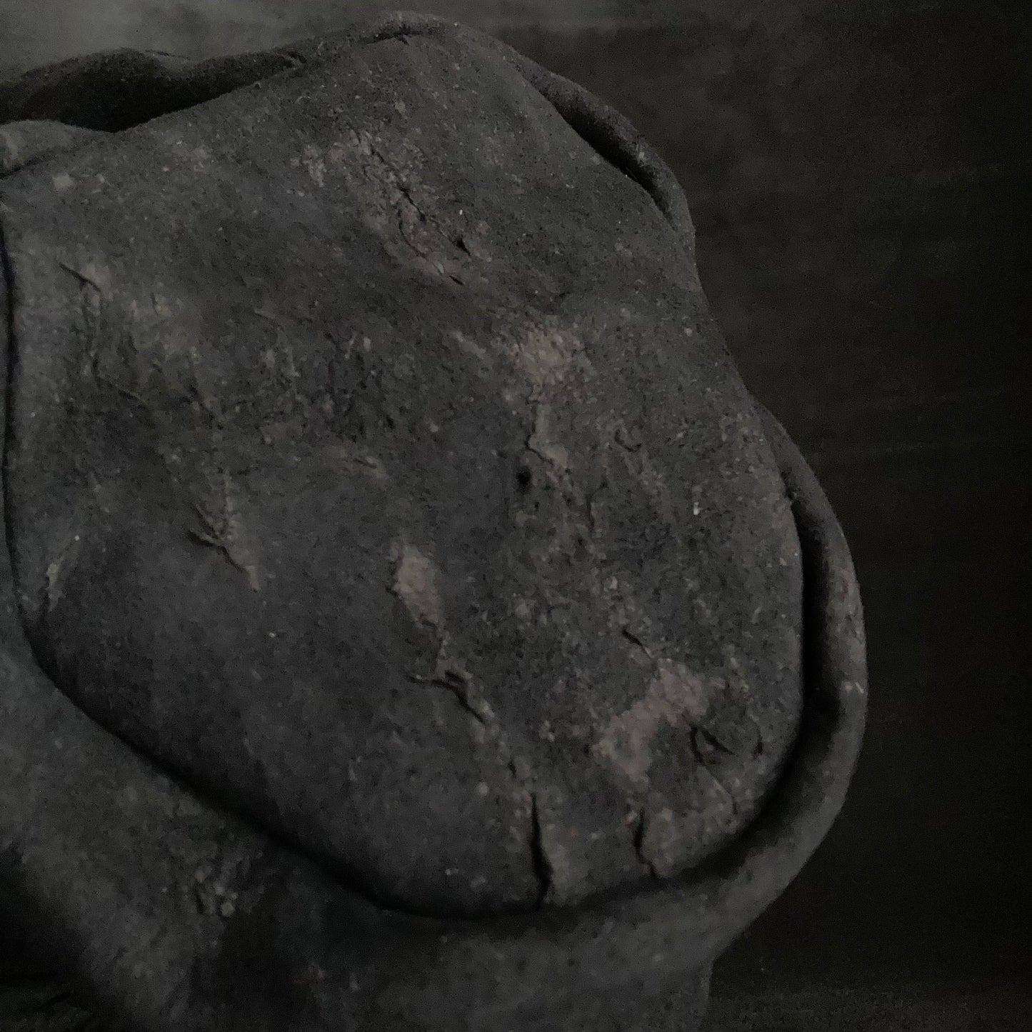 Floor under black leather turn cap