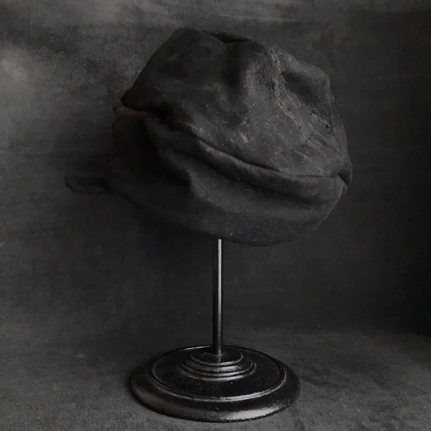 Floor under black leather turn cap